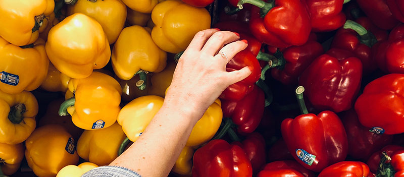 Stacks of produce inventory for a restaurant.